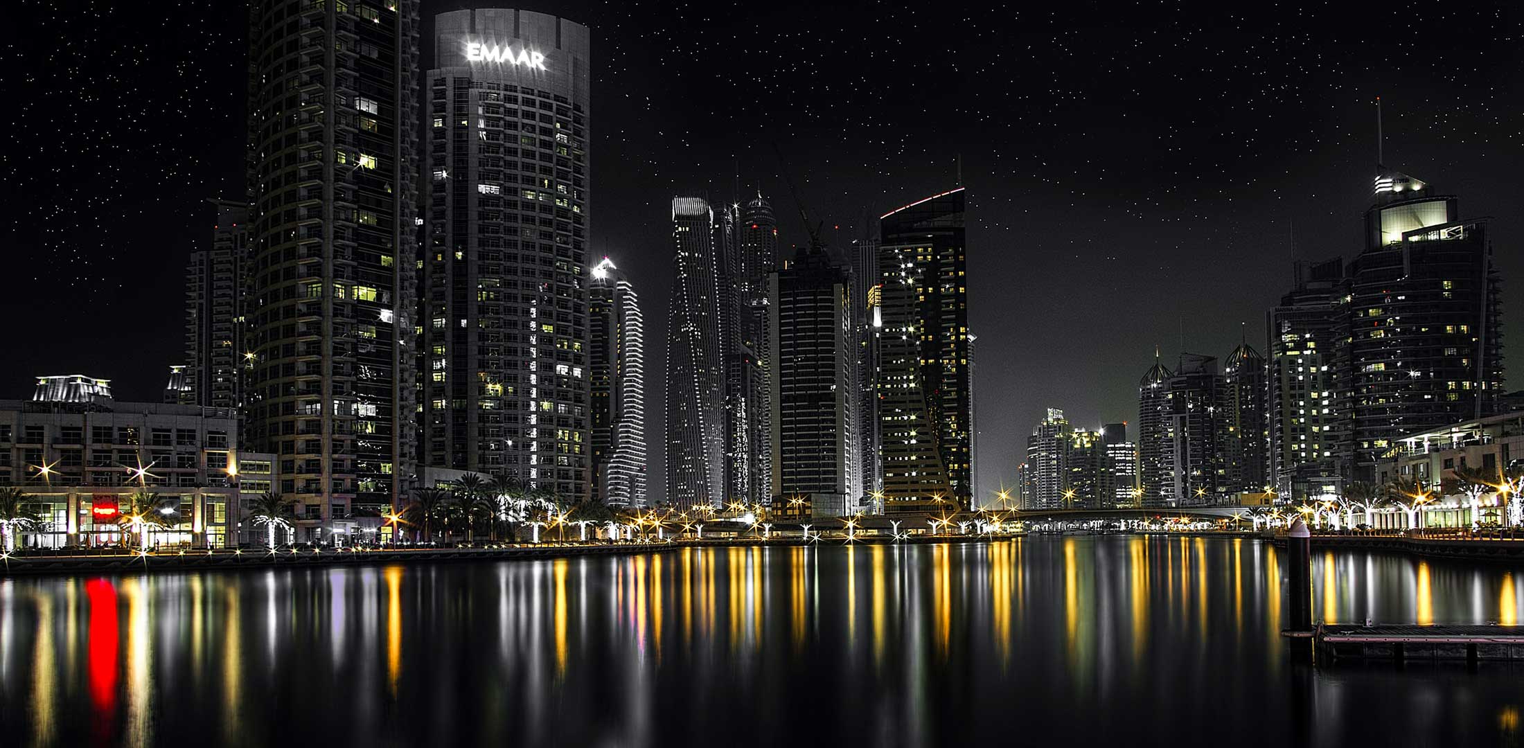 City skyscrapers in the night sky.